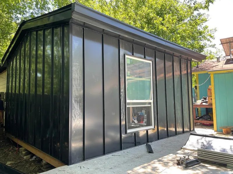 Black standing seam metal wall panels for Metal Roof Installation in Mechanicville